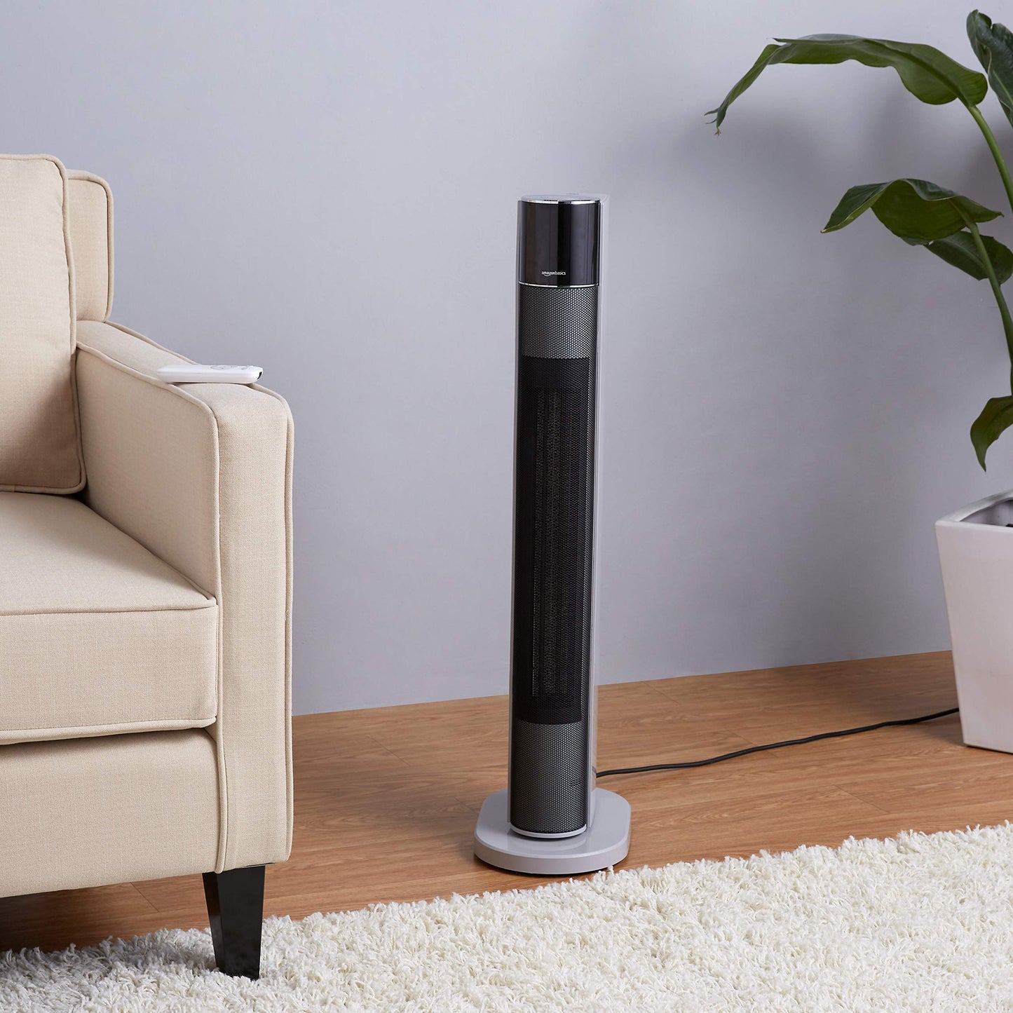Amazon Basics ECO Oscillating Portable Tower Heater, 2 Fan Speeds, 3 Heat Settings, Timer and Remote Control, with UK plug, 2200W, White